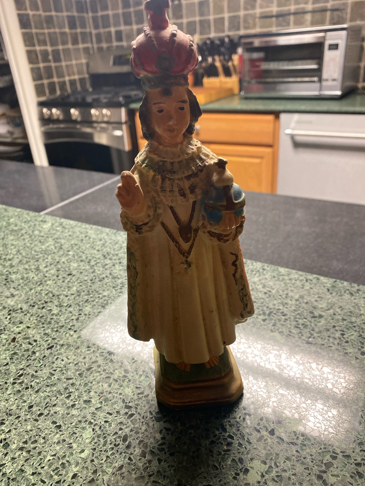 Submitted photo of Molded plaster devotional figurine depicting the Infant Jesus of Prague