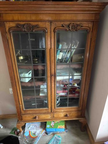 Vintage Wooden Display Cabinet with Glass Doors and Carved Accents