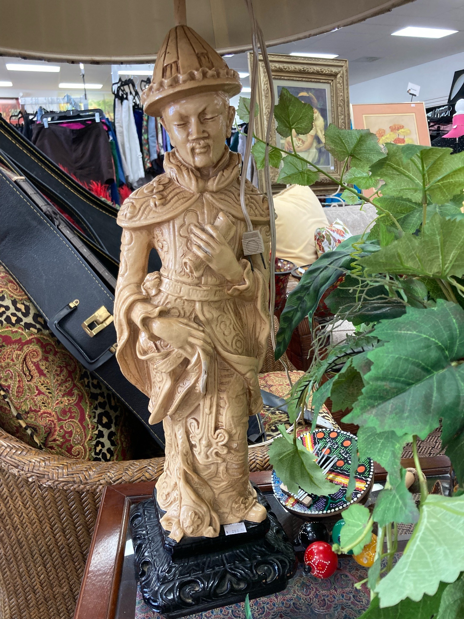 Submitted photo of Figural table lamp depicting an Asian dignitary