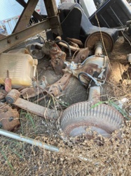 Assortment of Salvaged Automotive Drivetrain and Suspension Components