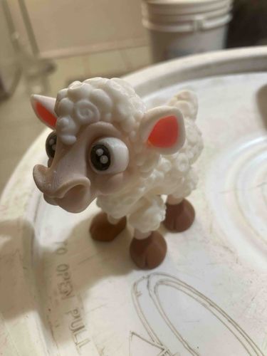 Stylized White Sheep Figurine