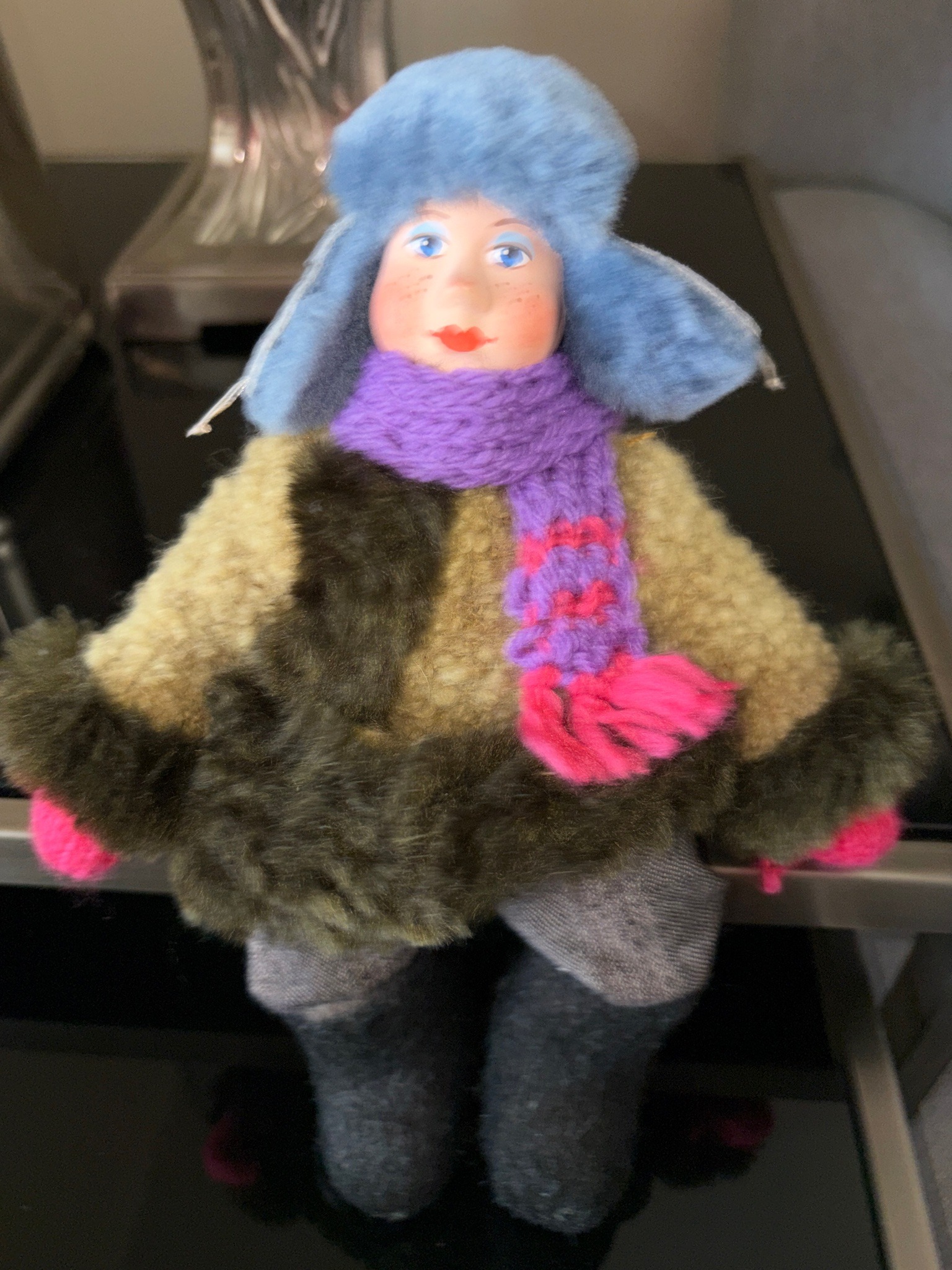 Submitted photo of Porcelain-faced winter doll with fabric clothing