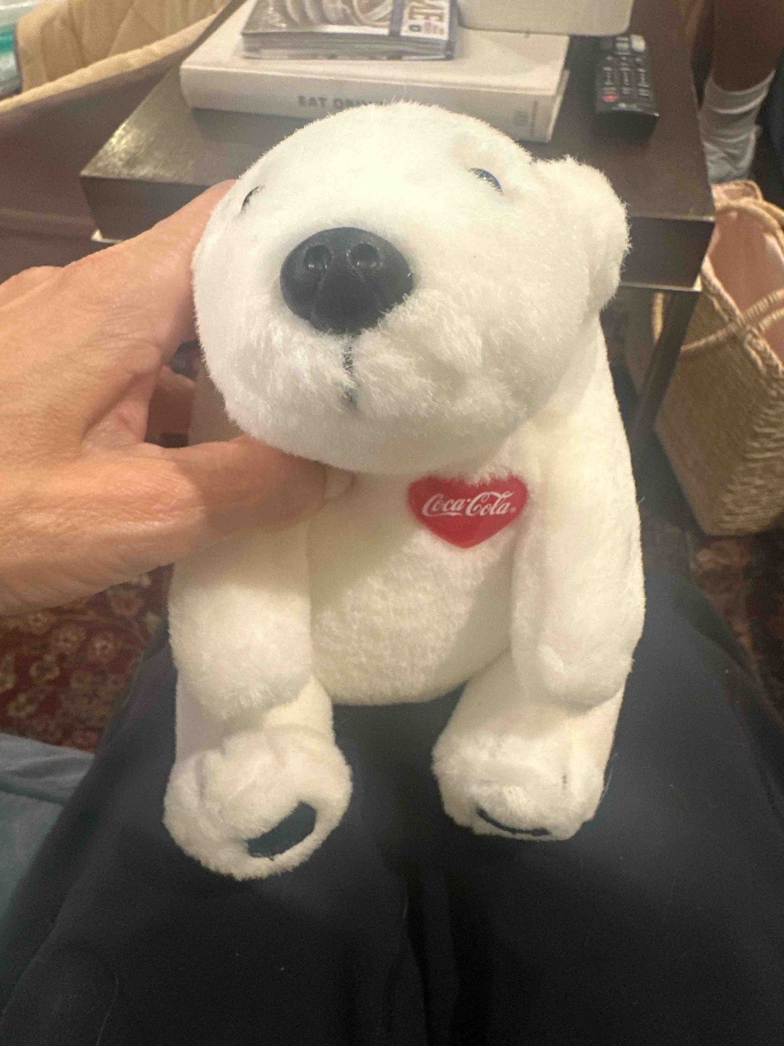 Submitted photo of Plush polar bear toy bearing a Coca-Cola logo patch