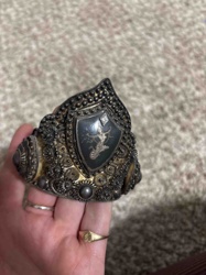 Ornate Silver-Toned Filigree Cuff Bracelet with Engraved Motif