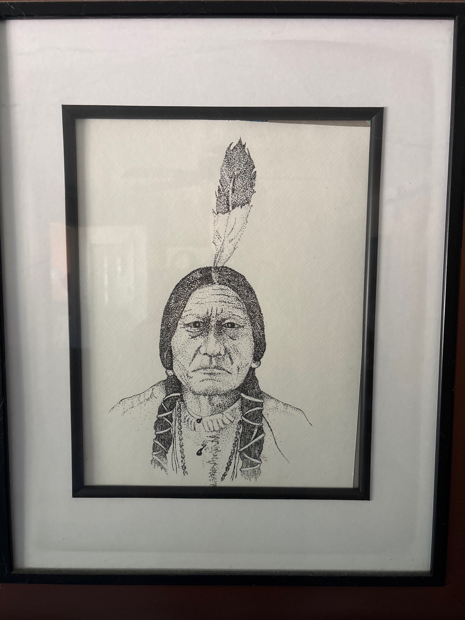 Submitted photo of Stippling ink drawing portrait signed 'Vian 09'