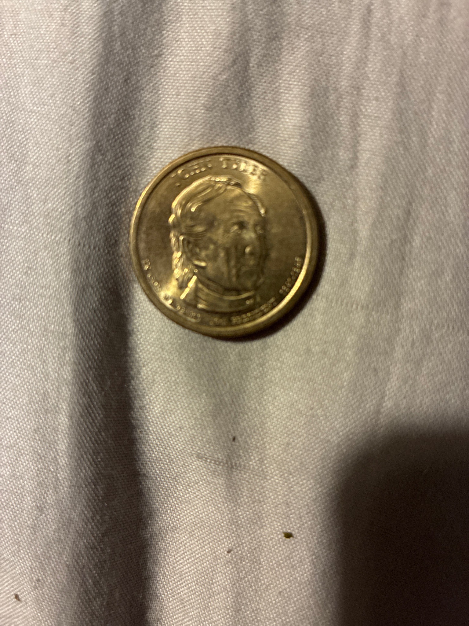 Submitted photo of Presidential $1 Coin depicting John Tyler (not authenticated)
