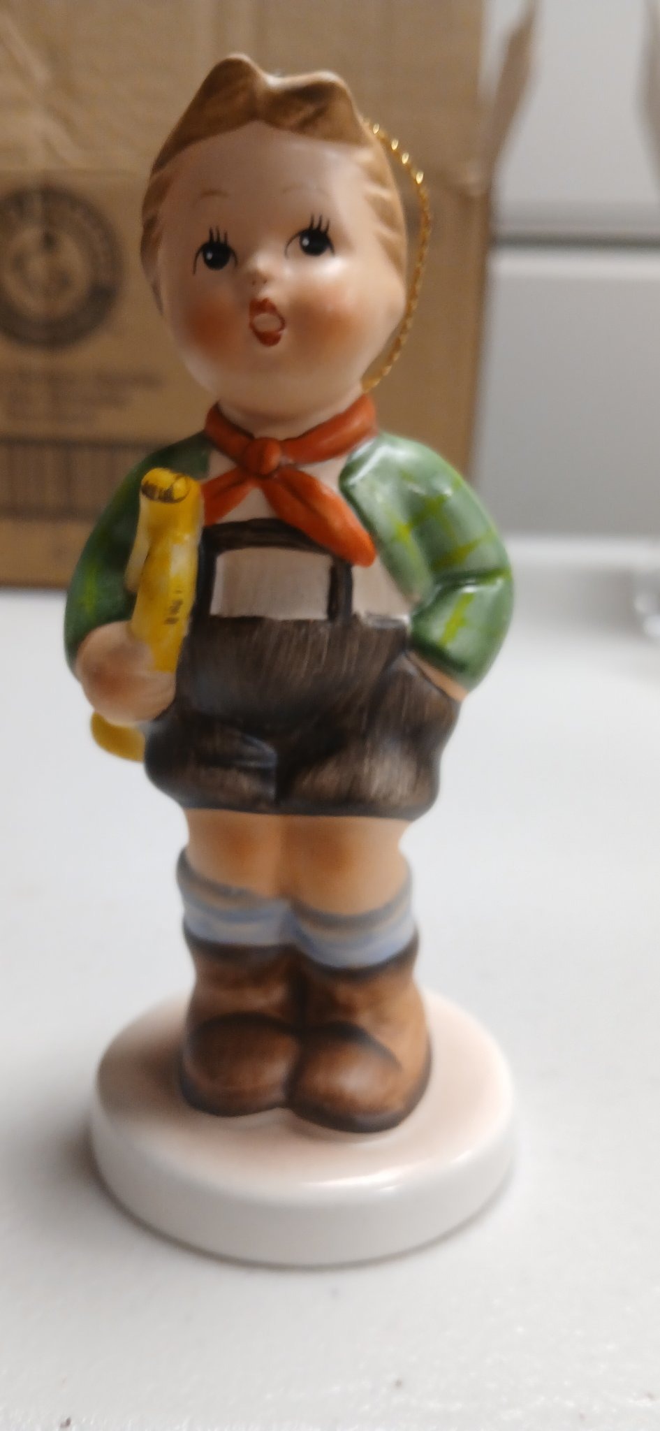 Submitted photo of Porcelain figurine ornament depicting a young boy in traditional Alpine attire (unauthenticated)