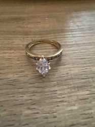 Gold Tone Marquise Solitaire with Channel Set Accent Stones Ring