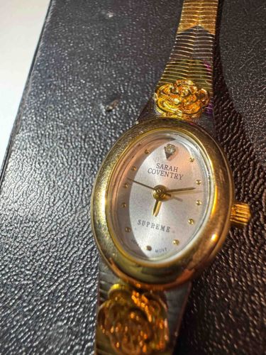 Sarah Coventry Supreme Gold Tone Women's Watch with Floral Embellishments