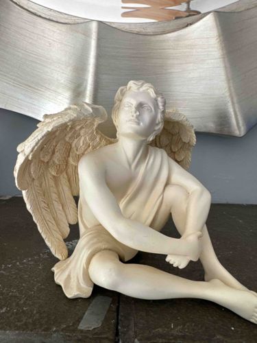 Seated Winged Male Angel Figurine