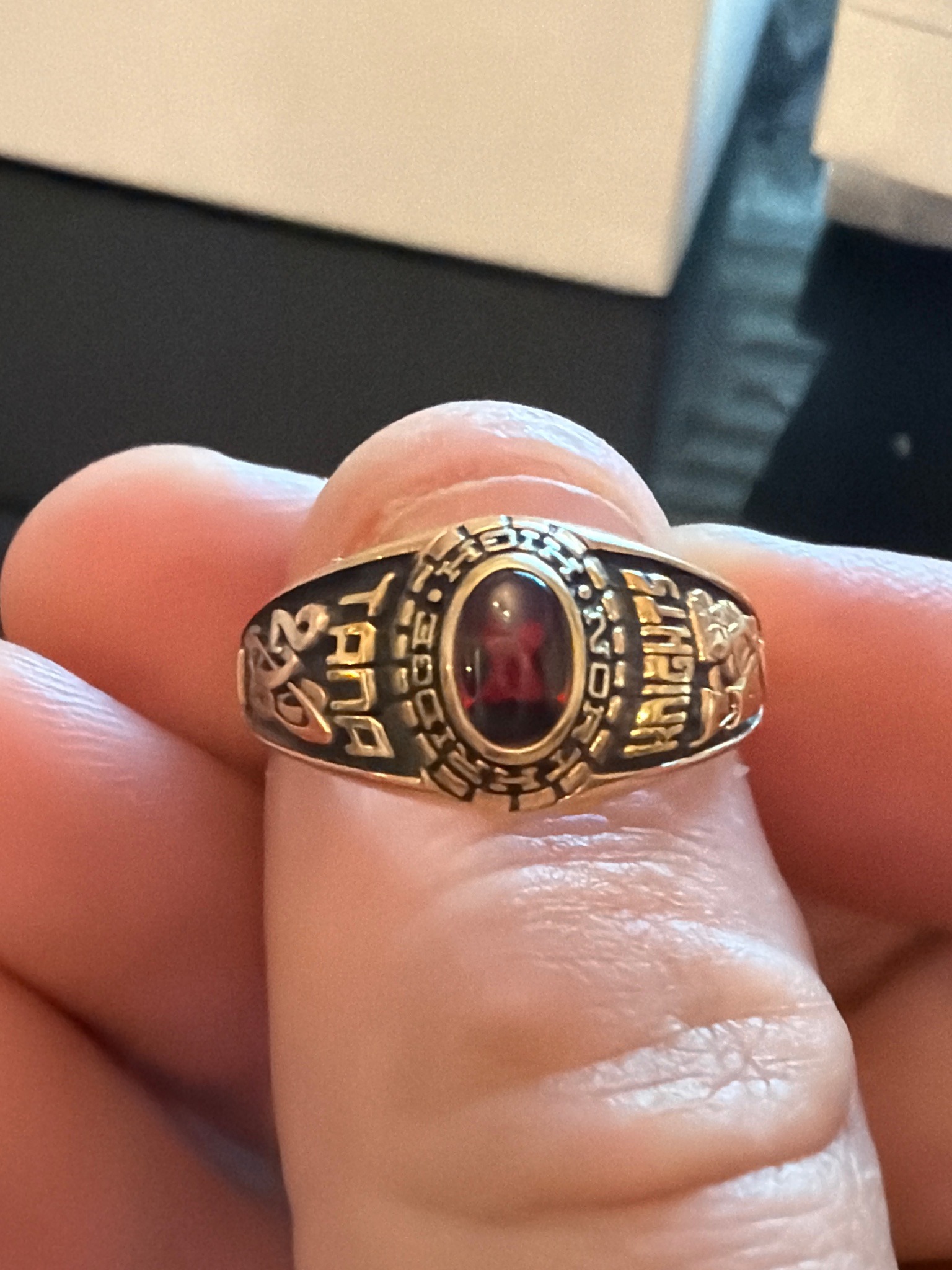 Submitted photo of Gold-tone class ring with red stone (not authenticated)