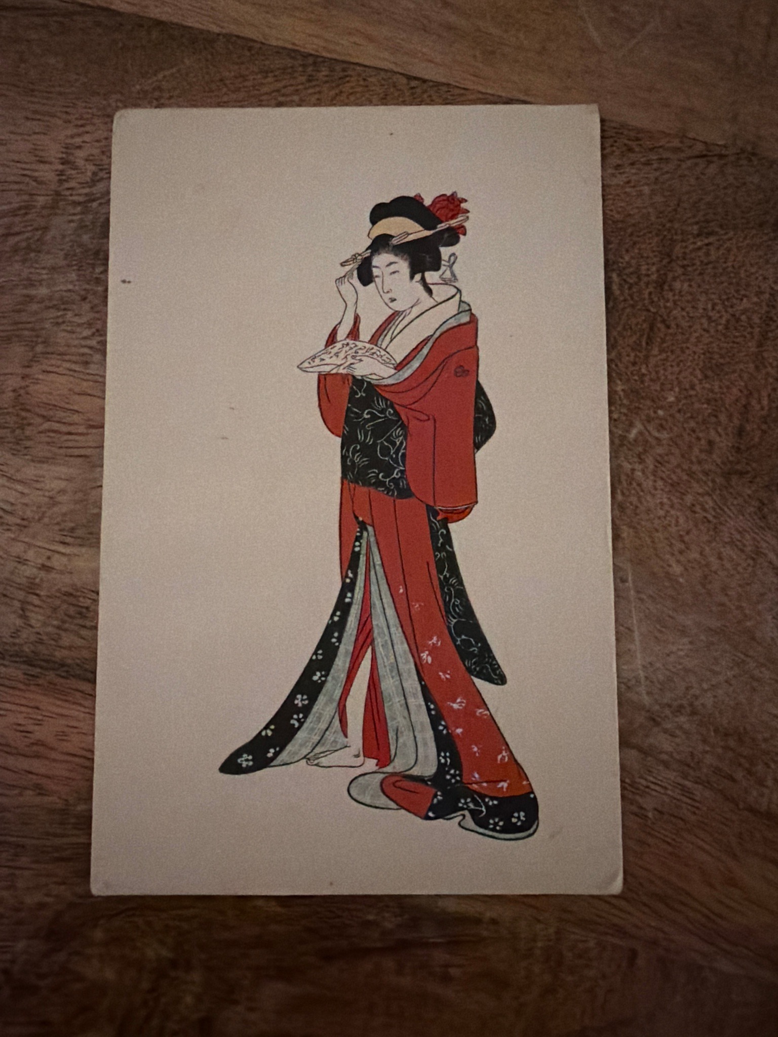 Submitted photo of Japanese woodblock print postcard depicting a standing courtesan (not authenticated)