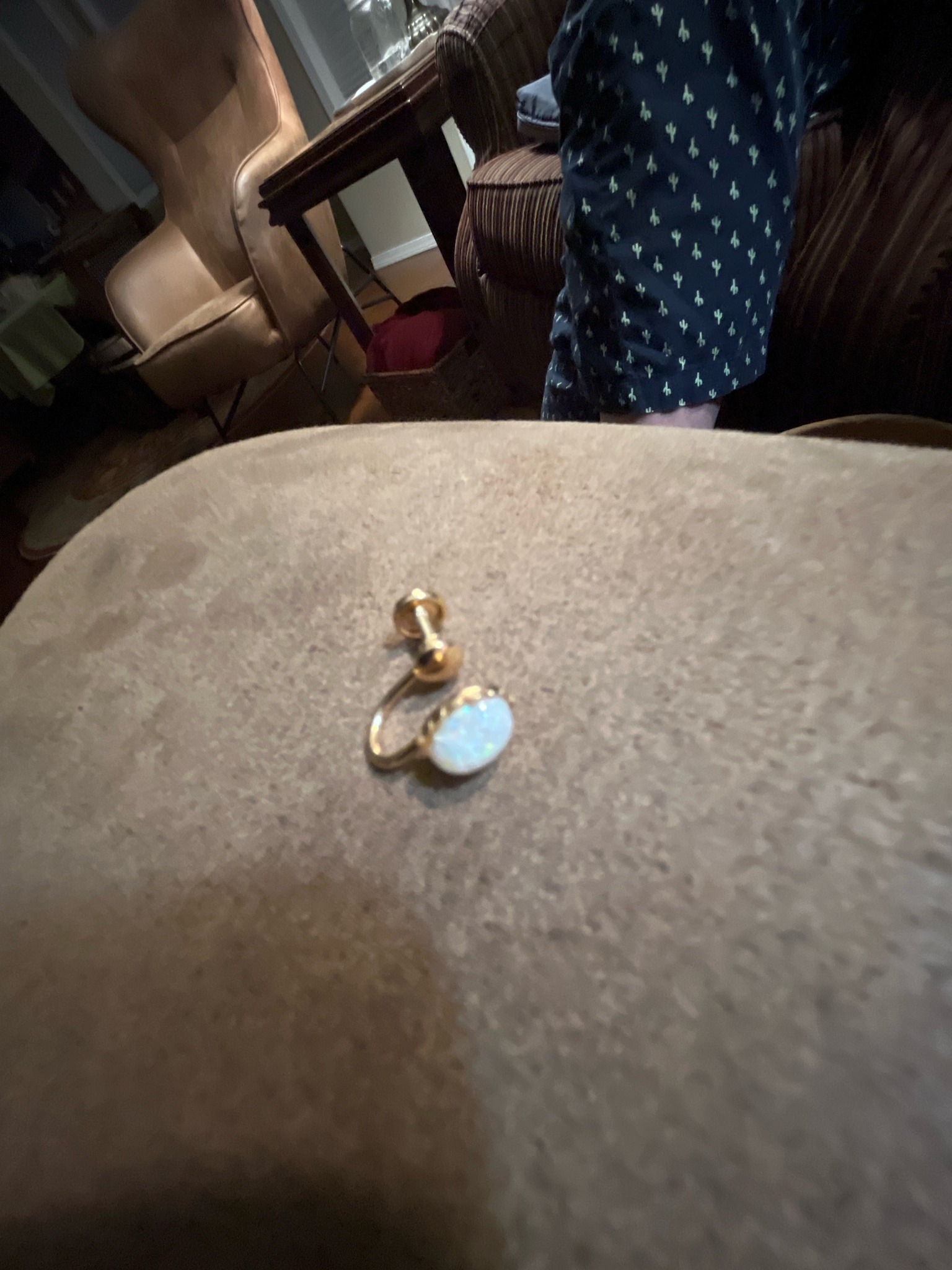 Submitted photo of Gold and opal screw-back earring