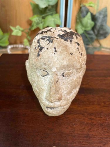 Weathered Human Head Sculpture