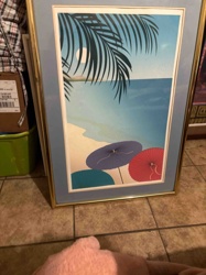 Framed Beach Scene Print with Palm Frond and Umbrellas