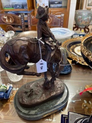 Bronze Cowboy on Horseback Sculpture