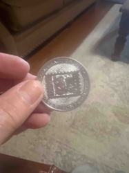 Silver-Toned Commemorative Coin with Stamp-like Design