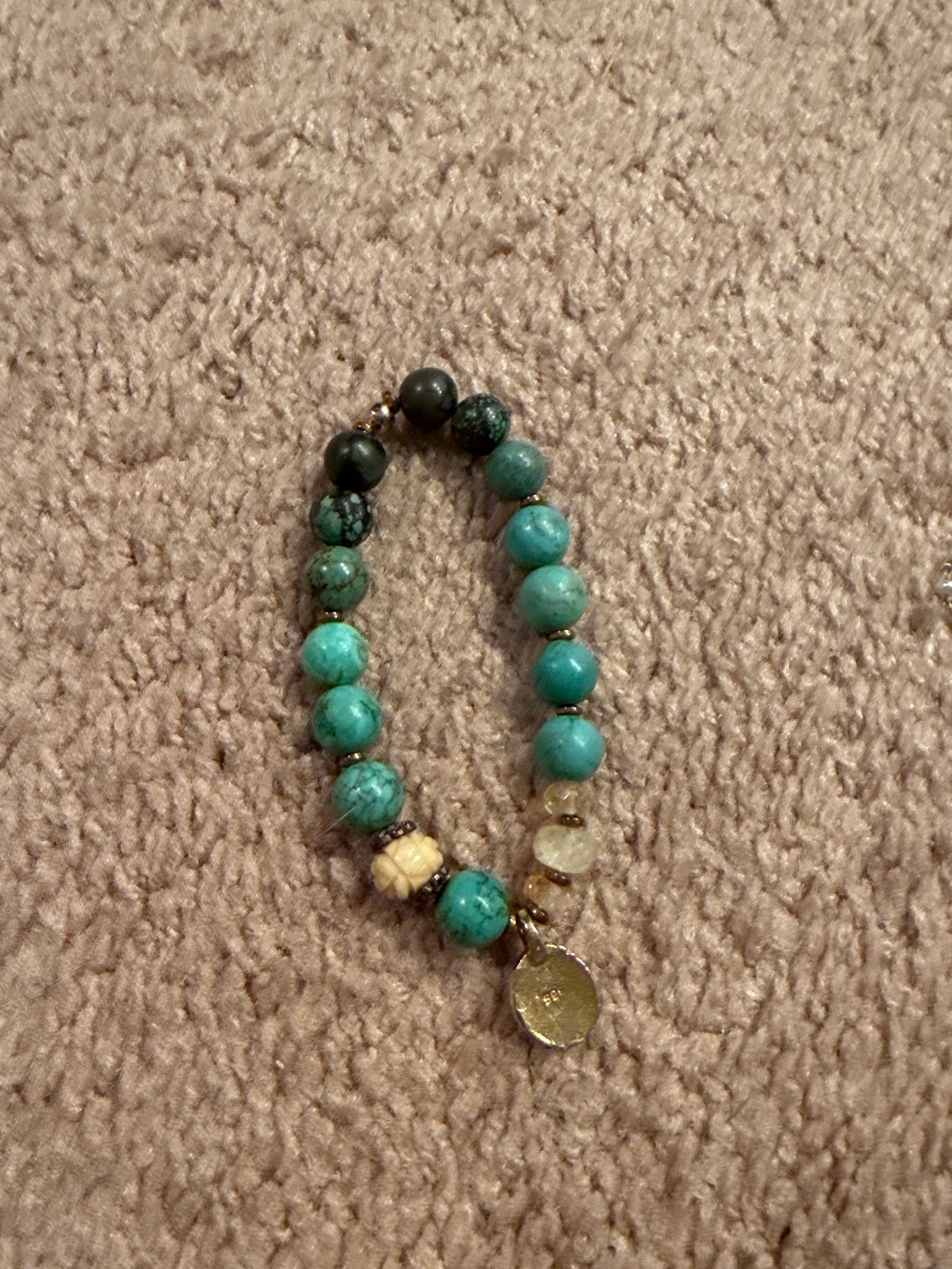 Submitted photo of Beaded gemstone charm bracelet (unauthenticated)