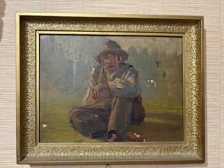 Painting of a Seated Man in a Hat