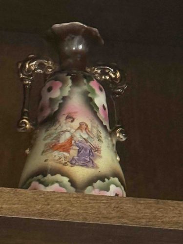 Porcelain Urn with Classical Figures and Floral Motifs