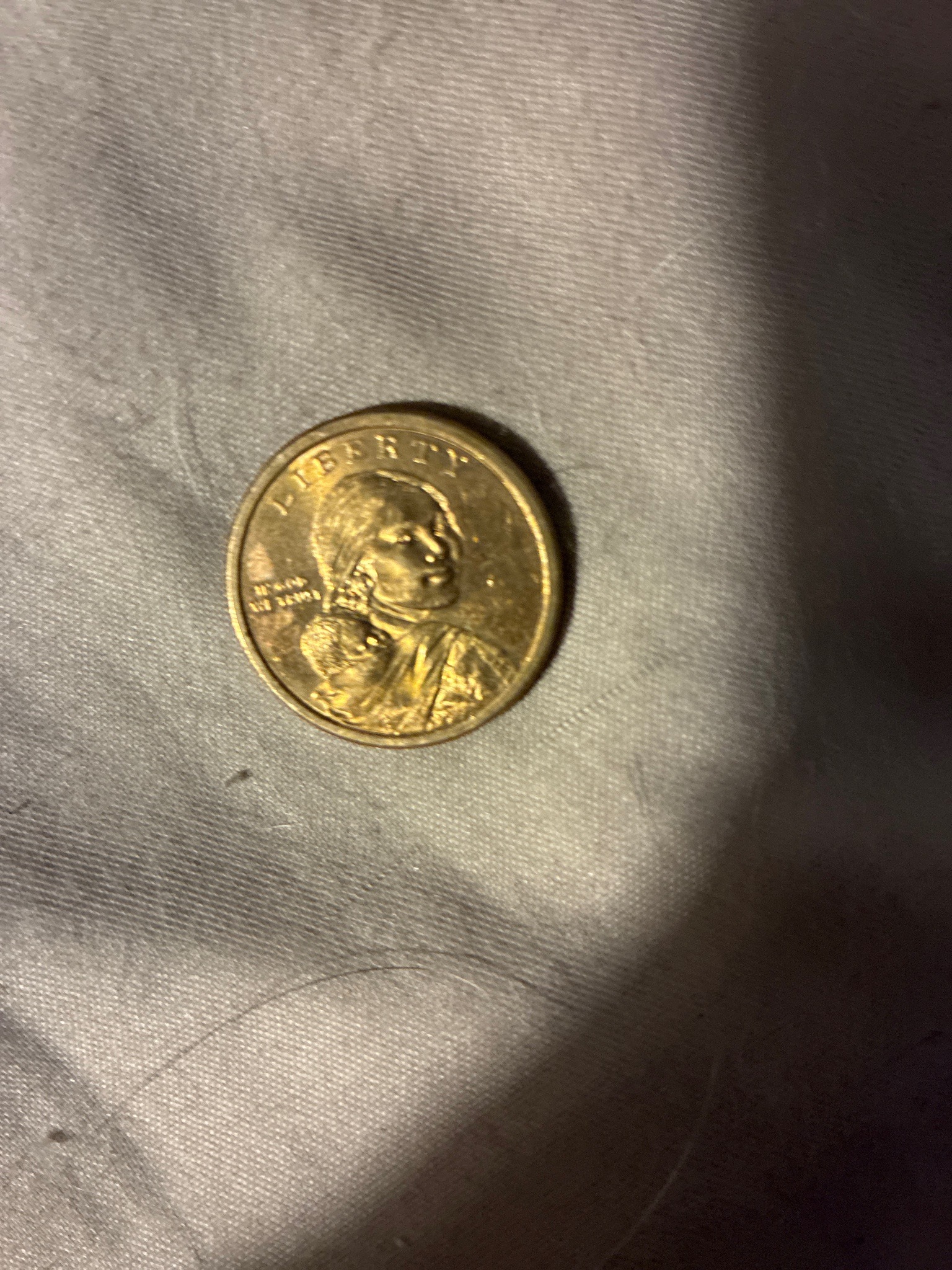Submitted photo of Sacagawea dollar coin (not authenticated)