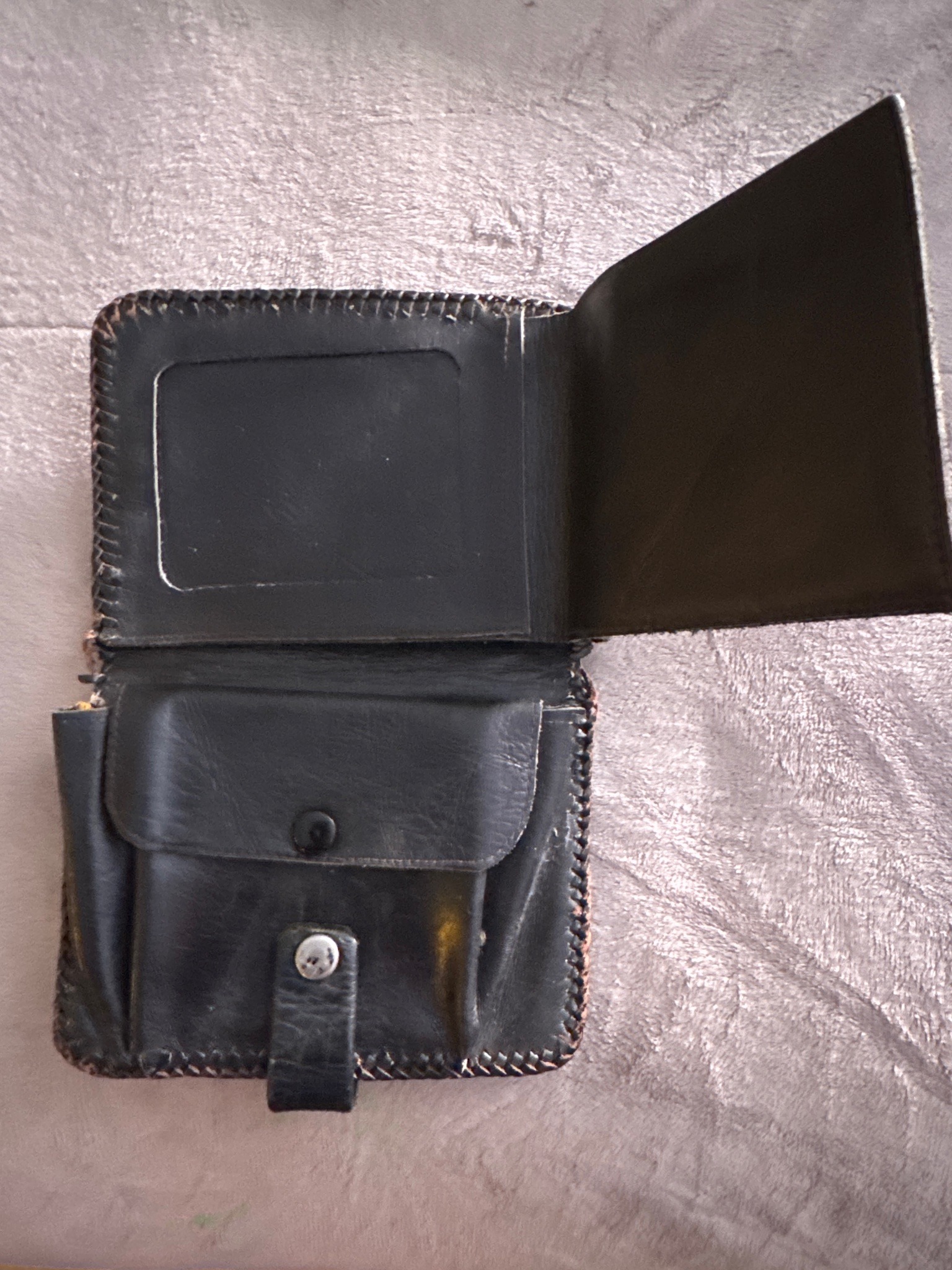Submitted photo of Vintage leather fold-over wallet or coin pouch