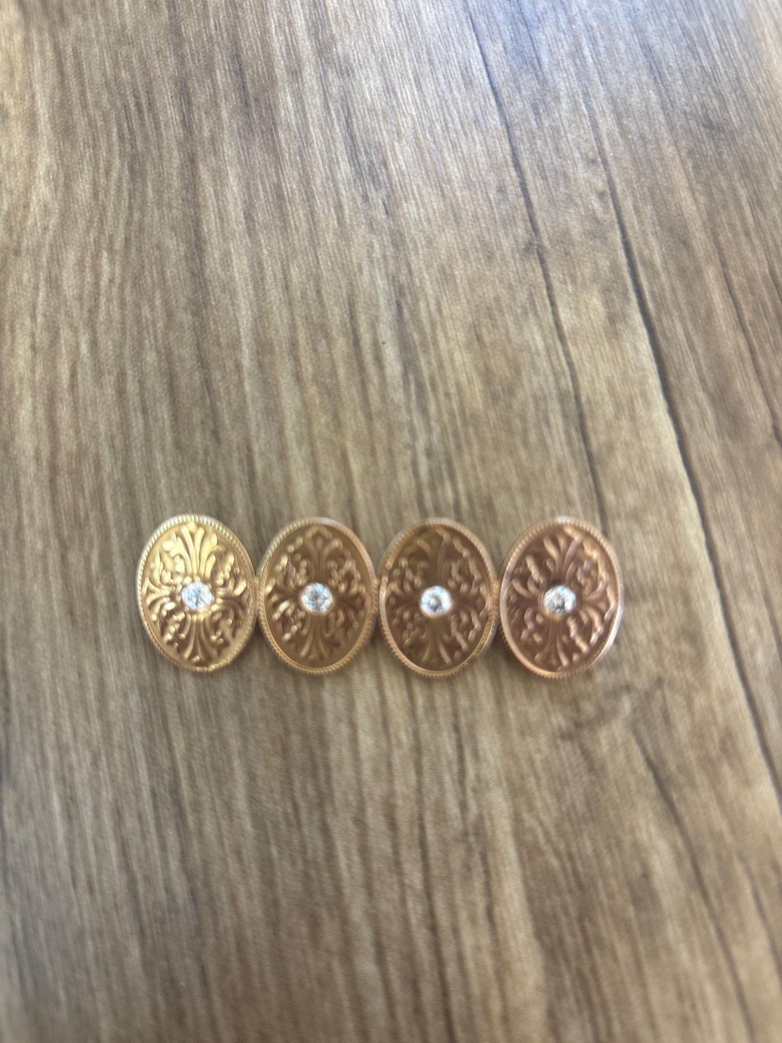 Submitted photo of Gold and diamond cufflinks, unverified maker