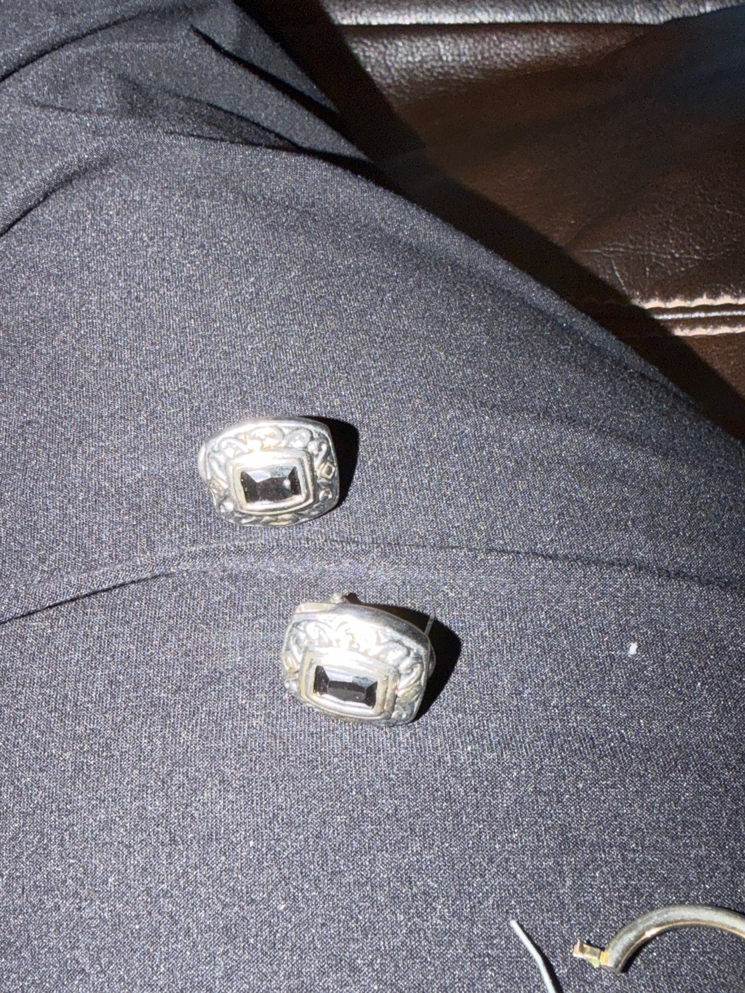 Submitted photo of Silver-tone metal and black stone earrings