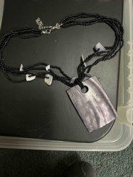 Multi-Strand Black Seed Bead Necklace with Mother-of-Pearl Pendant and Shell Accents