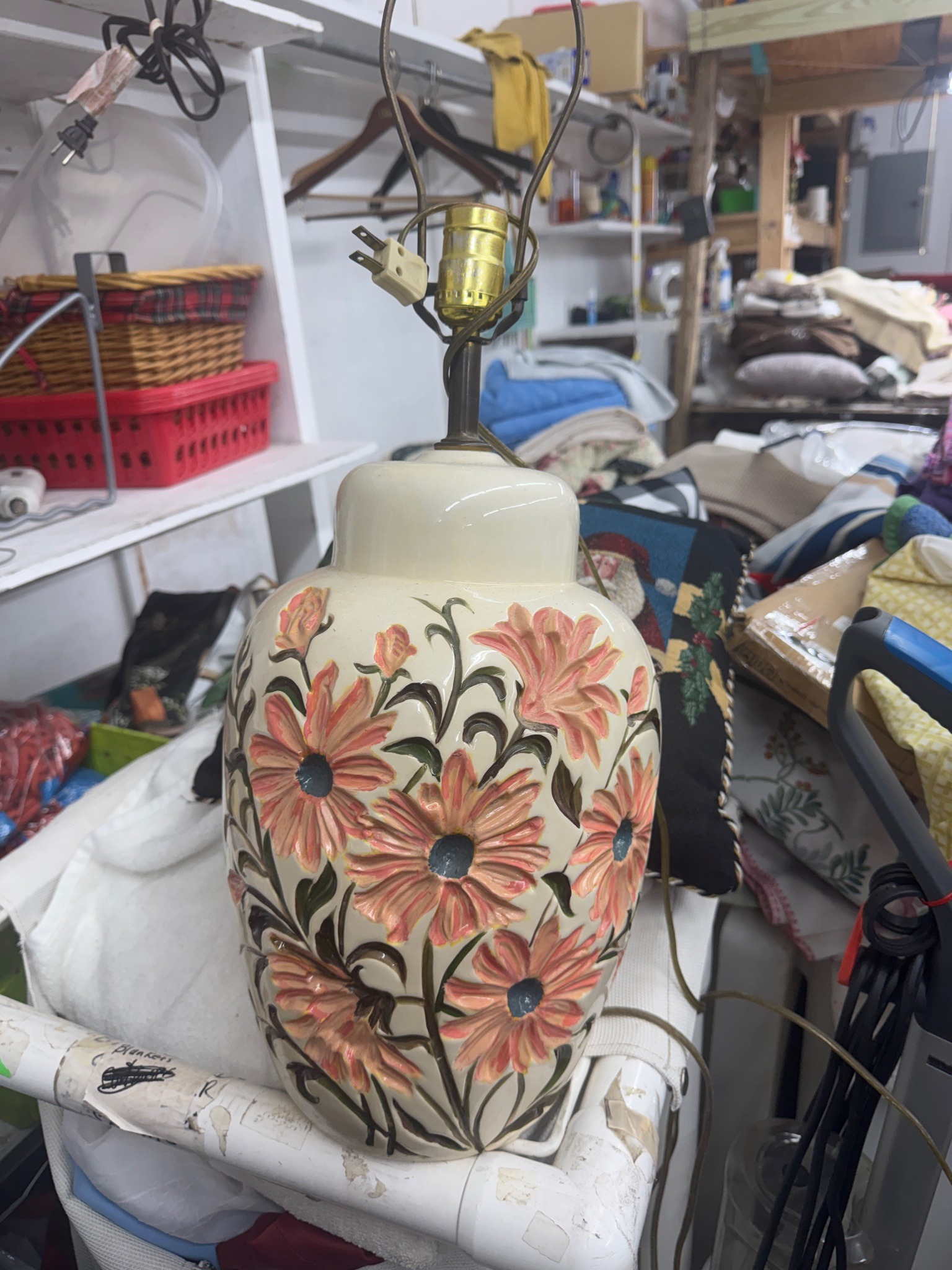 Submitted photo of Glazed ceramic table lamp with floral relief