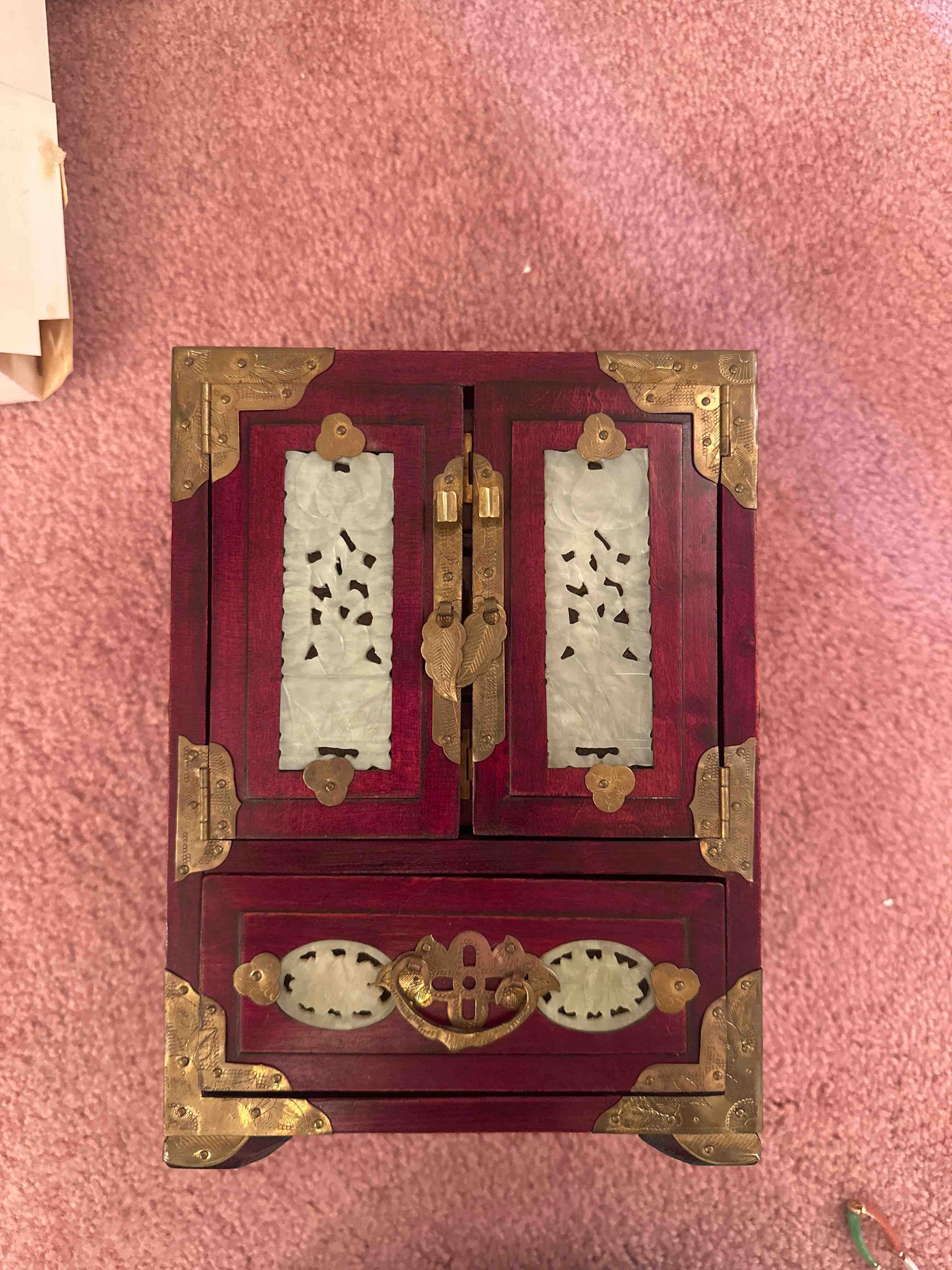 Submitted photo of Carved wood and jade-inset miniature cabinet