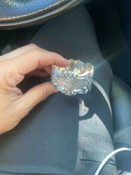 Ornate Silver-Toned Napkin Ring with Floral and Foliate Design