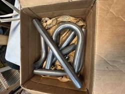 Assorted Automotive Exhaust Tubing Bends