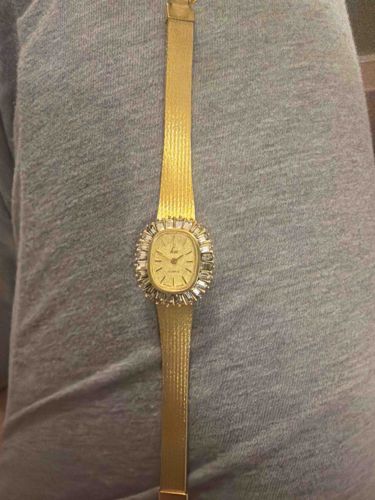 Vintage Gold Tone Ladies' Dress Watch with Baguette Diamond Halo