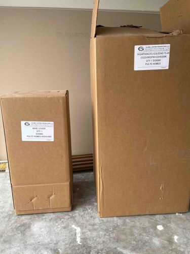 Unopened Cardboard Boxes (Lighting Fixture Components for Pulte Homes)