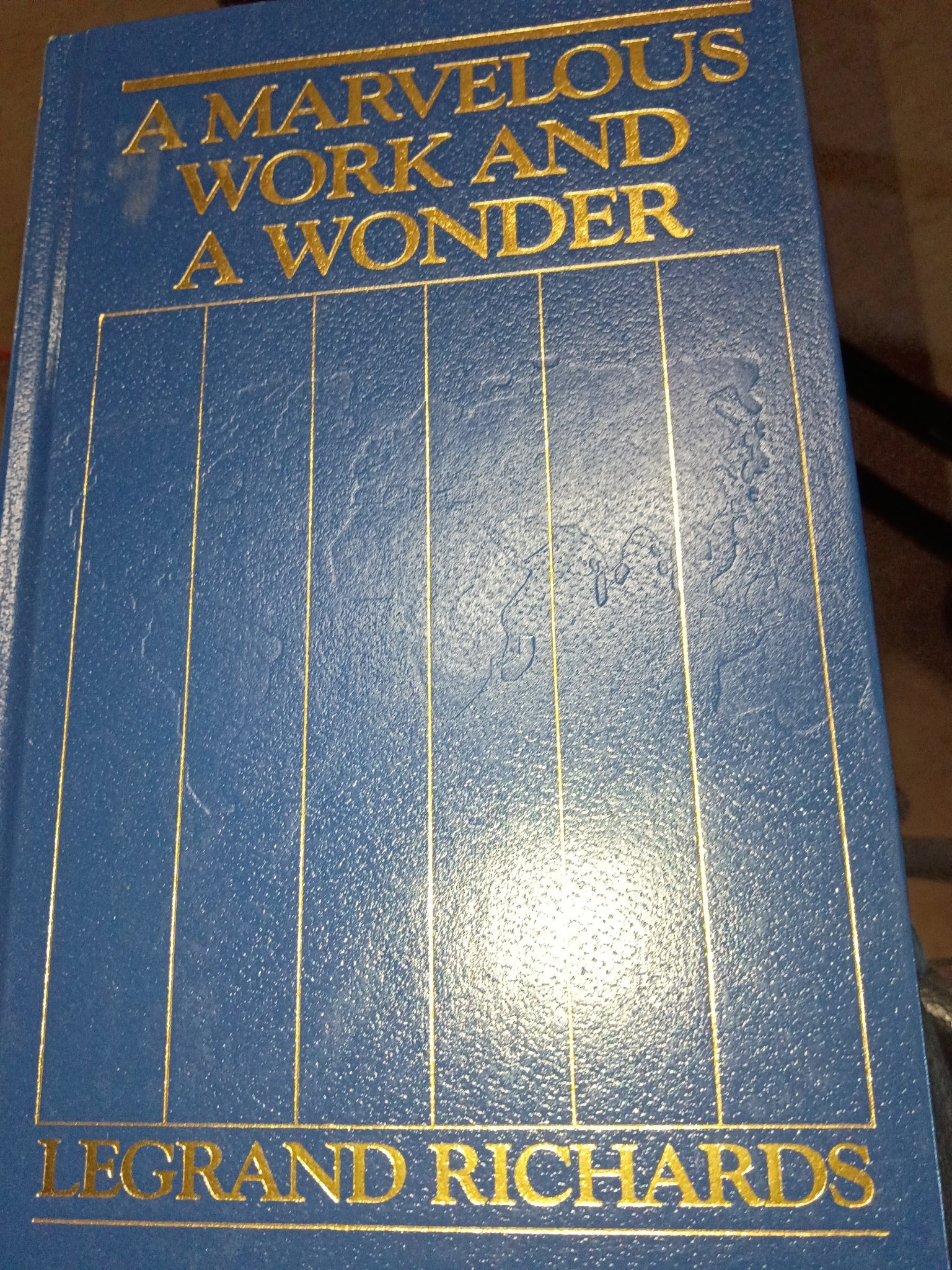 Submitted photo of Hardcover religious book featuring gold-stamped titling