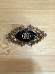 Vintage Black Enamel and Gold-Tone Filigree Brooch