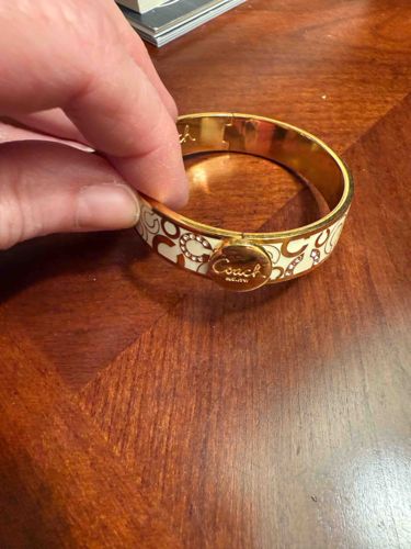 Coach White Enamel 'C' Logo Hinge Bangle Bracelet with Rhinestones