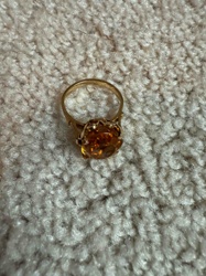 Gold-toned Ring with Orange Cabochon Gemstone