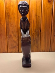 African Figural Carving of a Man with Drums