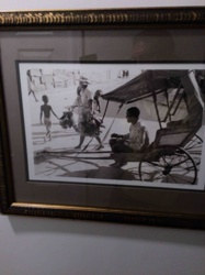Framed Black and White Photograph of a Rickshaw Scene