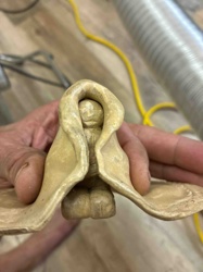 Wrapped or Hooded Carved Figure