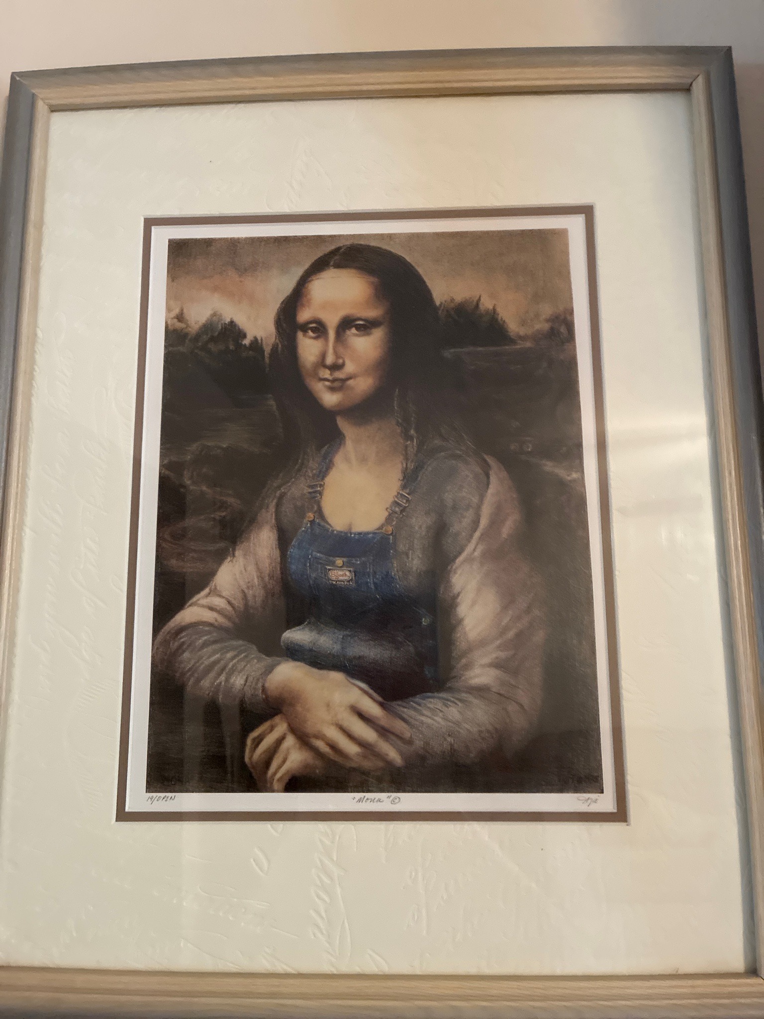 Submitted photo of Framed print after Leonardo da Vinci, bearing a signature and title