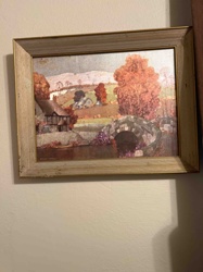Framed Landscape Print depicting a Cottage and Stone Bridge