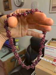 Red Beaded Necklace with Peach Bead Accent