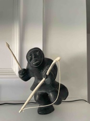 Inuit Hunter Stone Sculpture with Bow and Arrow