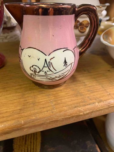 Pink Ceramic Pitcher with Luster Glaze and Landscape Motif