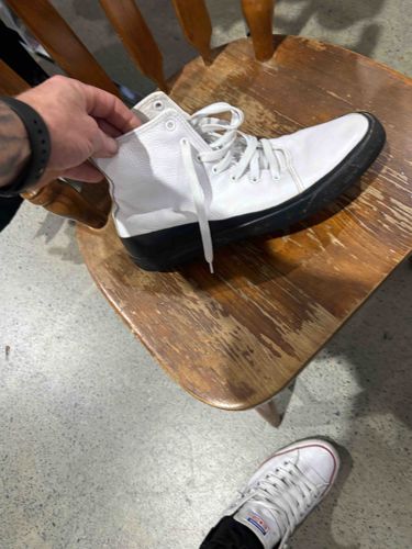 White High-Top Sneaker with Black Sole