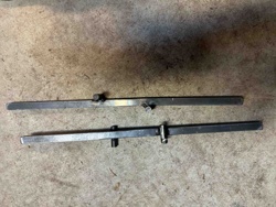 Adjustable Metal Bars (Likely Alignment Tools)