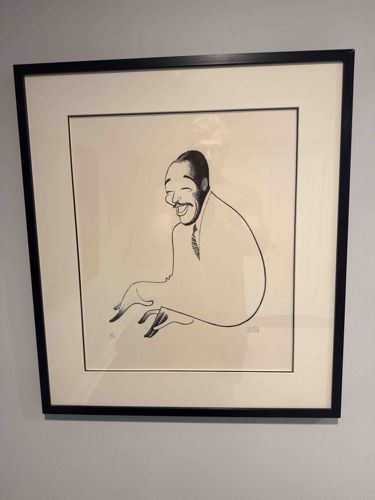 Framed Caricature of a Smiling Man